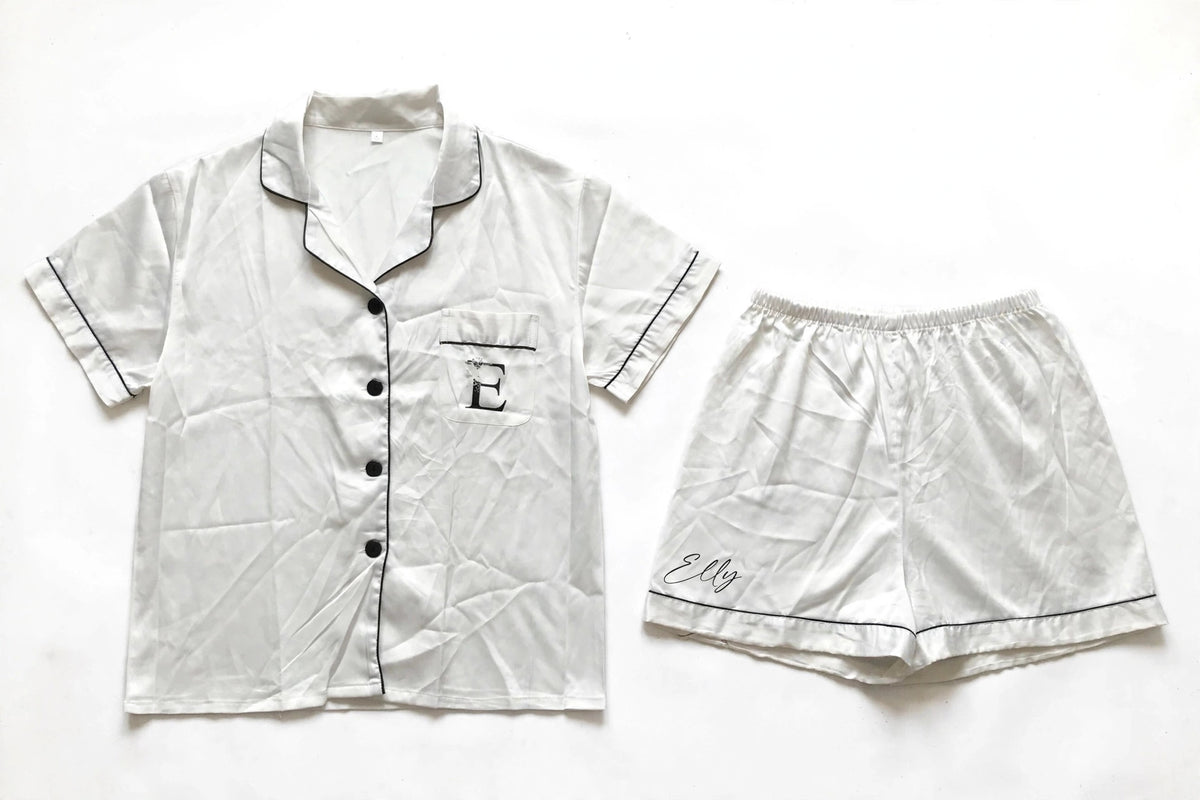 White satin pyjama set with Elly embroidery and E initial, short sleeve shirt and shorts