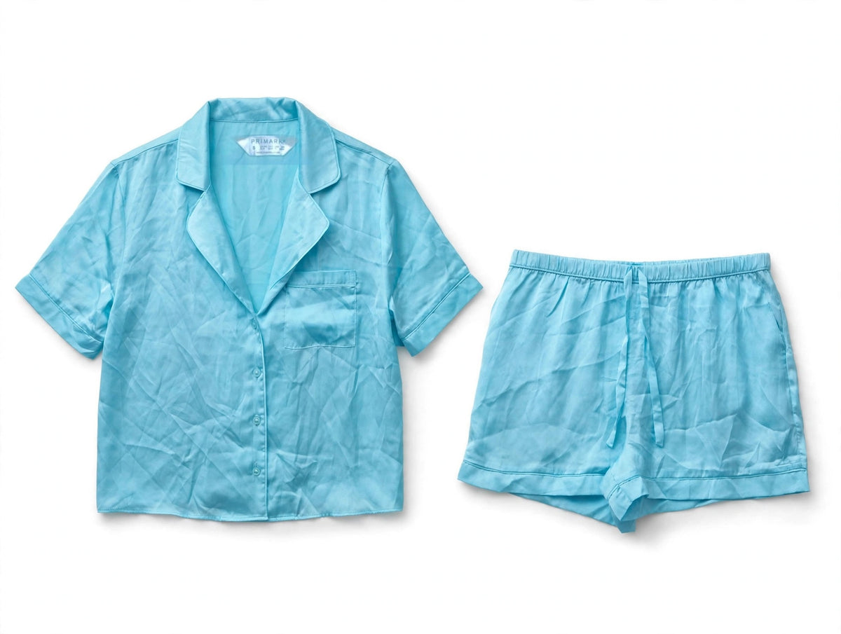 Primark light blue satin pyjama set, short sleeve shirt and shorts